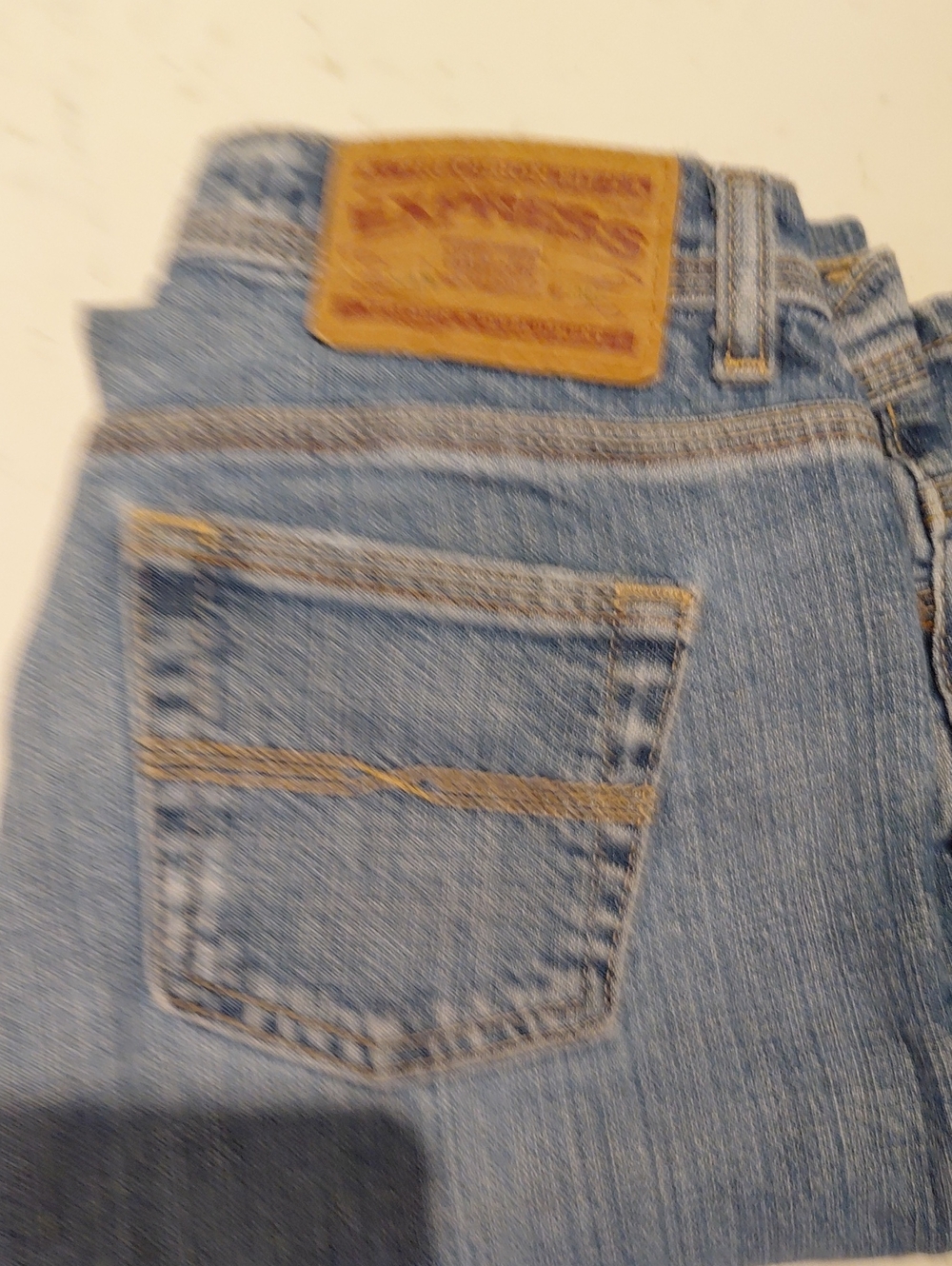 Light Blue Denim Jeans - Classic Pocket Style